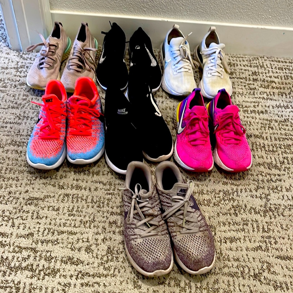 Seven pairs of Nike running shoes